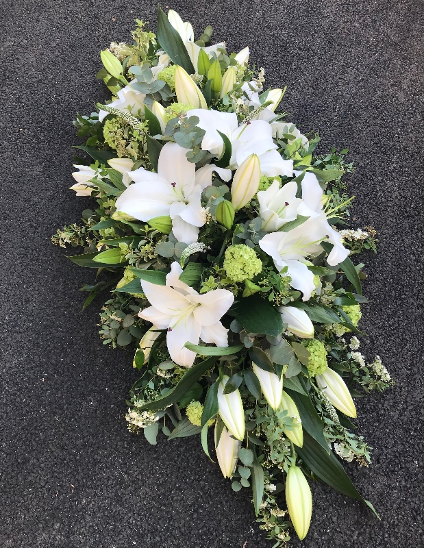 Casket Spray of all white lilies & foliage