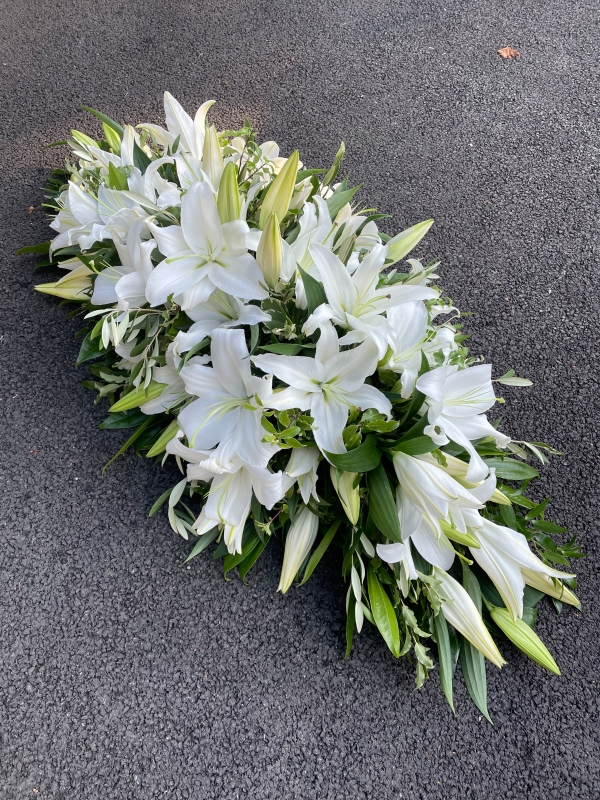 Casket Spray of all white lilies & foliage