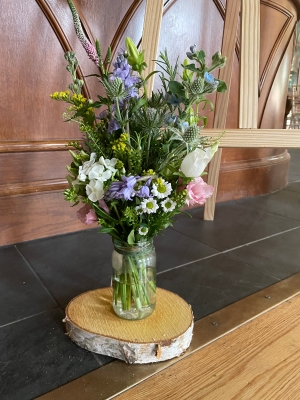 Jam jar table arrangement