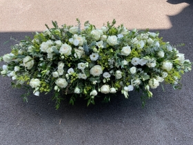 White funeral spray with roses & Lisianthus