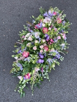 Pastel double ended funeral spray