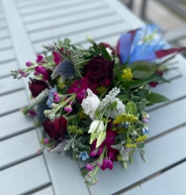 Tied posy arrangement with ribbon bow